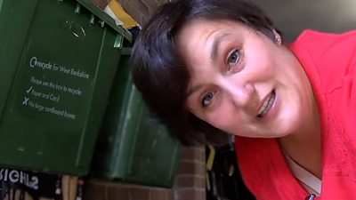 Janna Little inside the garage where she recycles her community's rubbish.