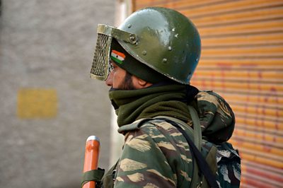 An Indian paramilitary officer in Kashmir