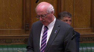 The DUP's Jim Shannon breaks down during a Commons debate on baby loss and is comforted by another MP, Anna Soubry.
