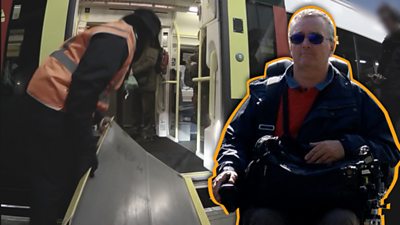 Man in wheelchair next to train.