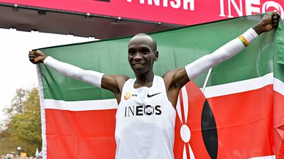 Eliud Kipchoge beats record for running a marathon in under two HOURS ...