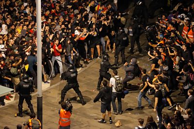 Police and protesters at El Prat Airport