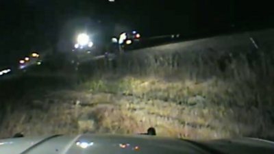 A Utah officer is being hailed a hero after rescuing a driver who crashed onto the tracks.