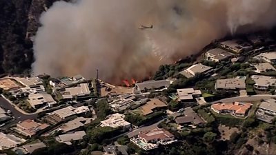 The blaze surrounded parts of an affluent Los Angeles neighbourhood, home to some Hollywood stars.