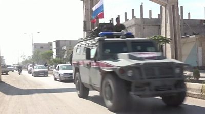Russian military vehicles enter Kobane