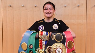 Katie Taylor with all of the lightweight belts