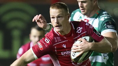 Johnny McNicholl attacks for Scarlets