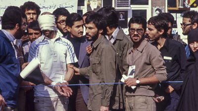 One American hostage and a group of Iranian students