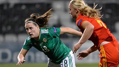 Megan Bell chases the ball against Welsh opposition