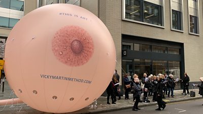 Huge inflatable breast outside Facebook HQ