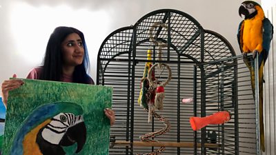 Kitty Kaur with an image of her parrot Rio