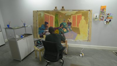 An artist at work at Black Rock in Senegal