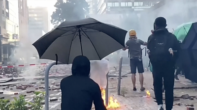 Protesters hit with tear gas at PolyU