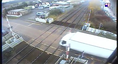 CCTV footage shows the vehicle being driven at speed, just moments before a train was due.