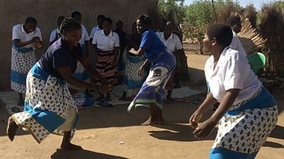 Malawian women dancig