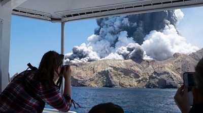 Volcano eruption seen from boat