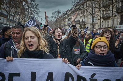 Protesters march in Paris against pension reform