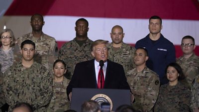 Donald Trump with US military personnel