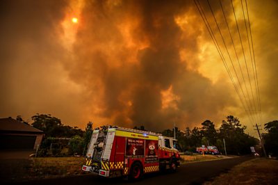 Soaring temperatures and strong winds mean an "awful day" for firefighters battling wildfires in Australia.
