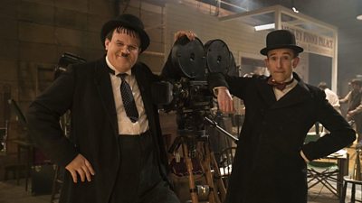 Steve Coogan and John C. Reilly in costume as Stan Laurel and Oliver Hardy