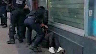 Footage shows Paris police officer punch protester