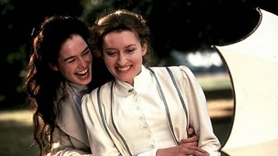 Lena Headey and Natascha McElhone in Edwardian dress fool around in an idyllic garden