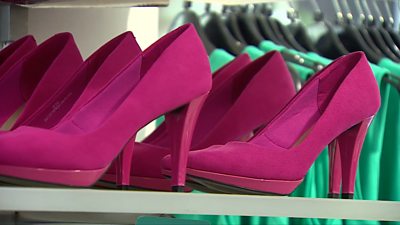 Pink shoes in a shop