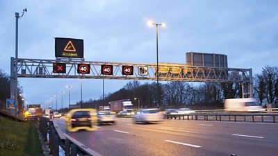 Smart motorway with an accident symbol in hard shoulder lane.