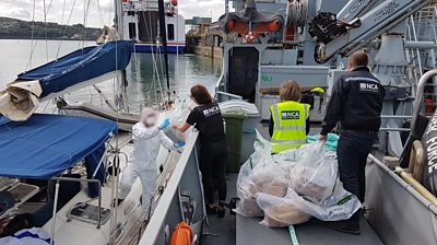 Officers searching the vessel