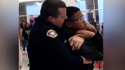 officer places child in chokehold