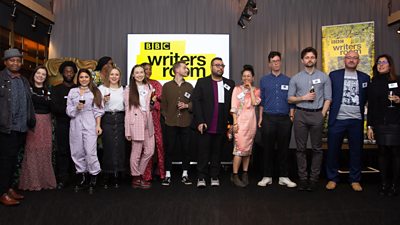 Drama Room writers line up for a photo