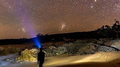 A person against a clear night sky in Australia