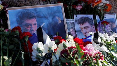 Flowers placed at a memorial to Boris Nemtsov