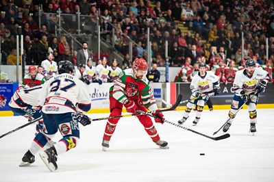 Charles Linglet of the Cardiff Devils shoots against Dundee Stars