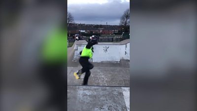 Skateboarding police officer