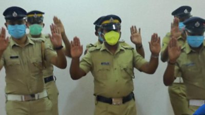 Indian policemen dancing