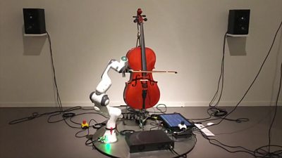 A robot arm playing a cello