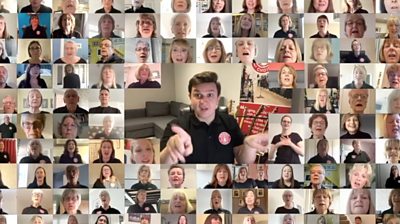 Video wall faces of Buskerteers Choir