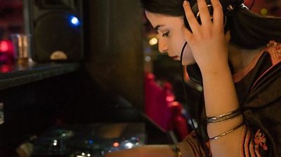 Woman DJing
