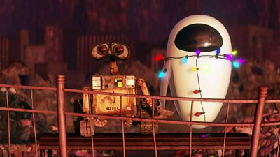 A scene from Wall-E - Wall-E and Eve hold hands