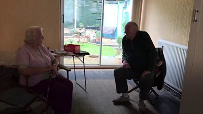 Couple in flood-damaged home