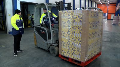 Forklift with a large pallet of ice creams