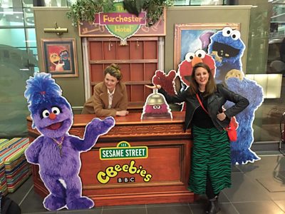 Here we are in happier times, swinging by the cardboard cutout of CBeebies The Furchester Hotel (Media City branch).