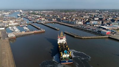 Drone pictures show shipping at Lowestoft, where most of its business is related to offshore energy.