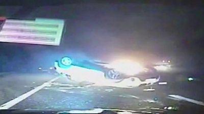 Police 4x4 flips during chase on M5 in Somerset