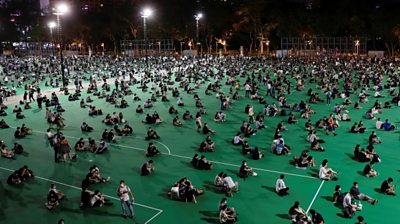 Crowds attend a Tiananmen Square vigil at Hong Kong's Victoria Park