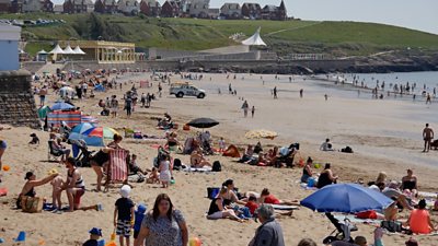 Barry Island beach with crowds on 24 June, 2020