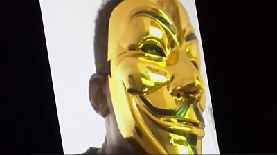 Rave organiser in a gold mask