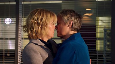 Holby City characters Bernie Wolfe and Serena Campbell just about to kiss