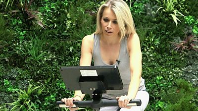 Lara Lewington on an exercise bije